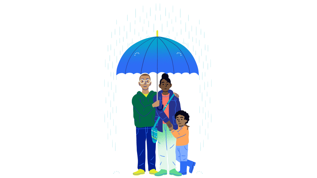 Familia se protege contra la lluvia